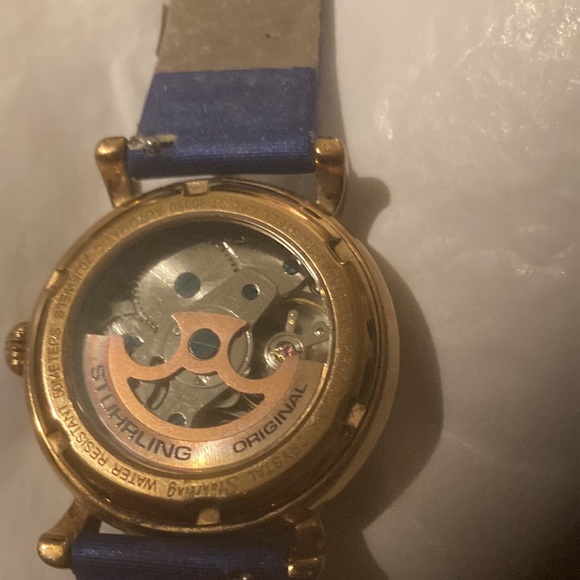 Gorgeous Stuhrling woman’s skeleton watch with several colored bands. - Picture 4 of 9